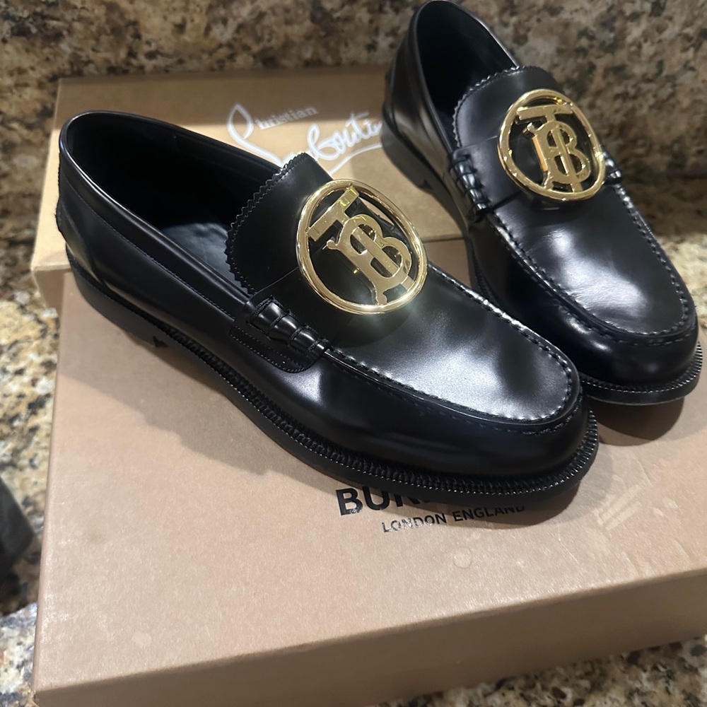 Burberry Black Loafers with Gold Emblem